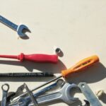 red and silver hand tool